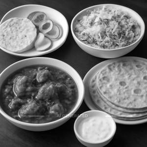 Chicken Masala Biryani And Salad With Raita