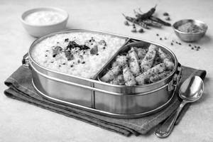 Curd rice with aloo bhujiya bowl