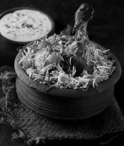 Kolkata Chicken Dum Biryani With Gravy, Raita & Salad
