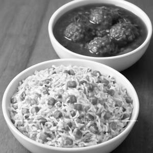 Veg Fried Rice With Veg Manchurian Gravy 