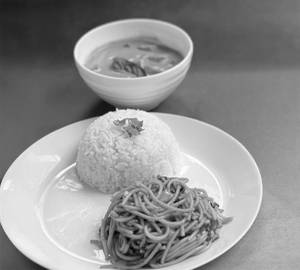 Thai curry meal with chilli garlic basil noodles