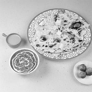 2 pcs Butter Naan with Dal Makhani