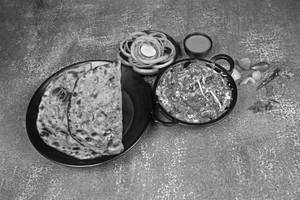 Kadhai Murgh With Garlic Lachha Paratha