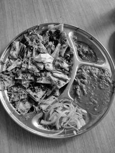 Chur Chur Naan Served With Chole + Onion Mint Chutney