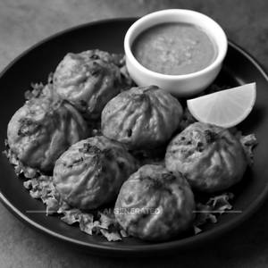 Veg afghani gravy momo