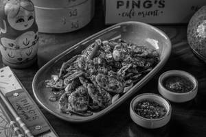 Wok Tossed Lotus Stem In Chilli Black Bean Sauce