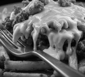 Fries With Chicken And Cheese Sauce