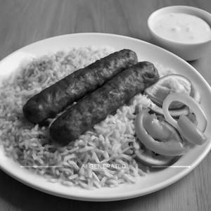 Egg Biryani And Raita With Salad