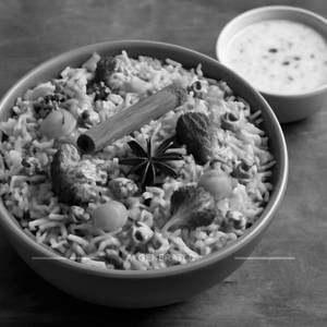 Veg Dum Biryani With Raita