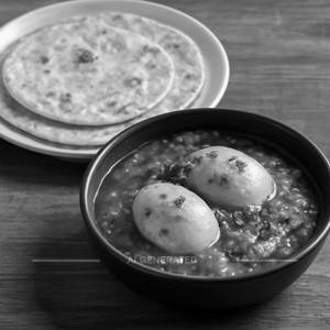 3 phulka with egg tomato curry