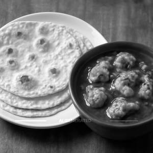 3 phulka with chicken curry