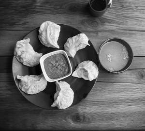Pork Momo - 6 Pc With Chutney & Soup