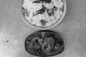 Chepala pulusu with bagara rice