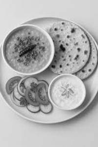 Dal Fry+ +4roti  salad+raita
