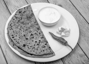 Matar paratha with curd