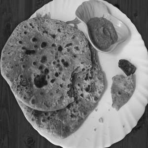Special sattu paratha served with pickle [2 pieces]