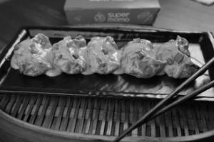 Chicken Pan Fried Momo in Butter Masala