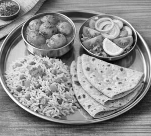 2 Roti / Dum Aloo / Jeera Rice / Salad / Papad / Achaar