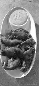 Schezwan Pan Fried Chicken Momos
