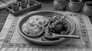 Pua & Champaran Mutton Curry