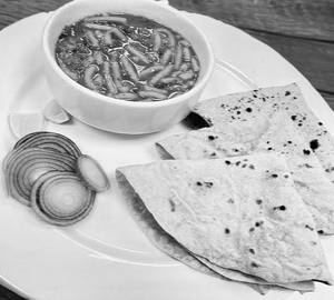 4 Rotis With Sev Tamatar Sabji