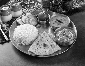 Paneer Butter Masala Roti And Rice Meal