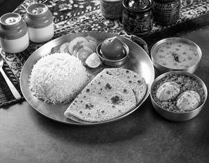 Egg Curry Roti And Rice Meal