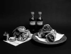 Malai Chaap Roll + Chaap Butter Masala Roll + 2 Coke (250 Ml)
