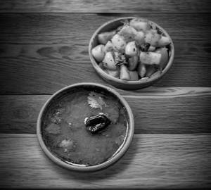 Poondu Rasam 450ml with potato fry 250 Ml