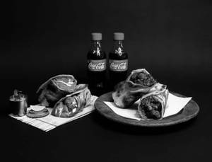 Chaap Butter Masala Roll + Chilli Paneer Roll + 2 Coke (250 Ml)