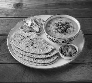 Mung Dal Tadka Served With 4 Pcs Rotis, Salad & Pickle (Spl Combo Offer)