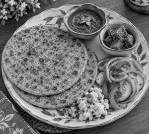 Gobi Paratha (2 Pcs, Served With Chutney, Sauce, Salad & Pickle)