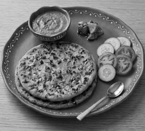 Aloo Paratha (2 Pcs, Served With Chutney, Sauce, Salad & Pickle)