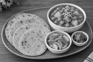 Aloo Chole Curry Served With 4 Pcs Rotis, Salad & Pickle (Spl Combo Offer)