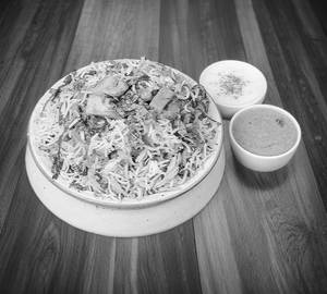 Paneer Veg Biryani With Salan, Raita, Salad & Chutney