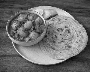 Aloo Dum with  Lacha Paratha