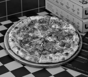 Dhamaka (Chicken Makhni Pizza)