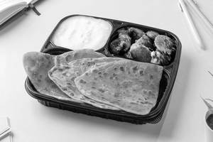 Masala Arbi with Curd & Paratha Lunchbox