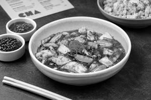 Exotic Vegetables And Cottage Cheese In Schezwan Sauce Gravy