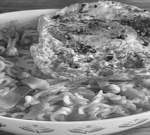 Soupy maggi with egg pouched