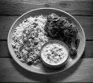 Ghee Rice With Vizhinjiyam Chicken