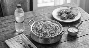 Chicken Biryani(half)+ Kakas Special Chicken Tikka (4pc)+1 Water Bottle