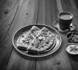 Ginger Tea + 2 pcs aloo onion paratha