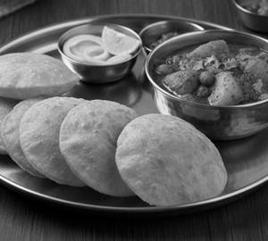 Poori(5 Pc) + Aloo Chana Sabzi