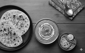 Dal Fry And 2 Butter Tandoori Rotis Combo