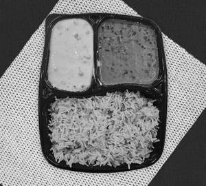 Jeera rice with dal makhani and boondi raita