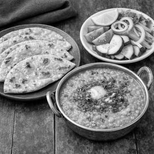 Dal Fry with 4 Butter Roti and Green Salad