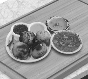 4 Pcs Daal Baati + Special Chokha