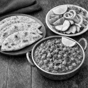 Chana Masaa with 4 Butter Roti and Green Salad