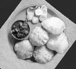 Chicken curry with 4 pic poori